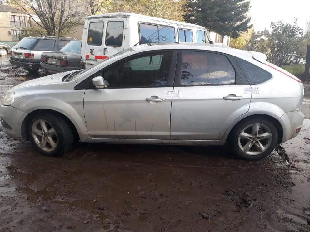 Iban armados en un auto y con dos menores
